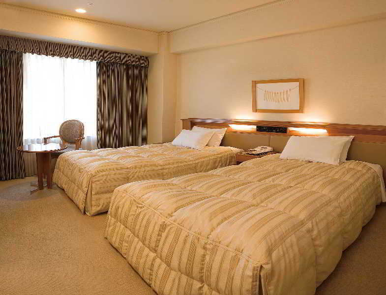 Courtyard By Marriott Shin-Osaka Station Ξενοδοχείο Δωμάτιο φωτογραφία A room at the hotel